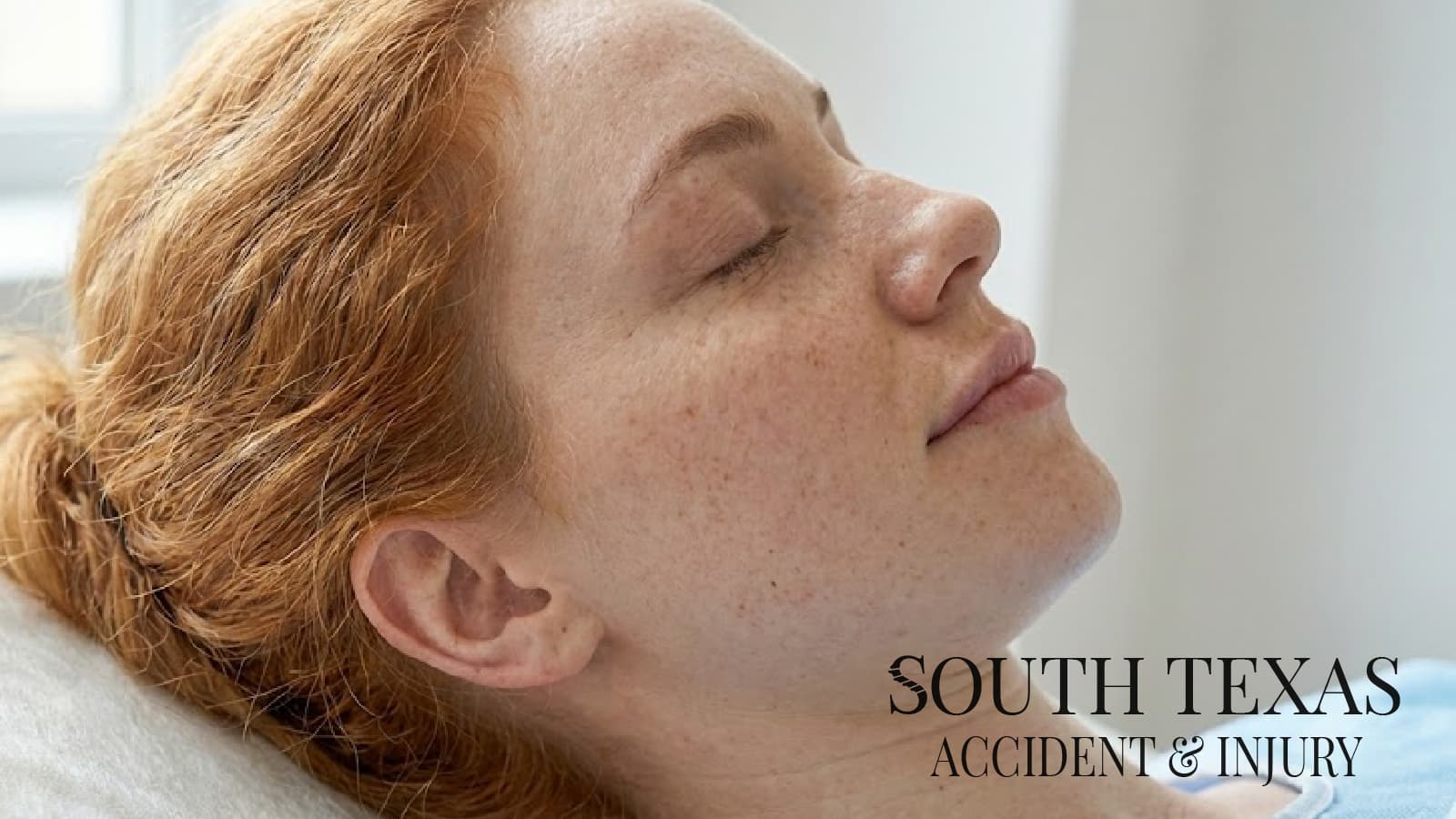 A calm therapy room with a treatment table and soft lighting